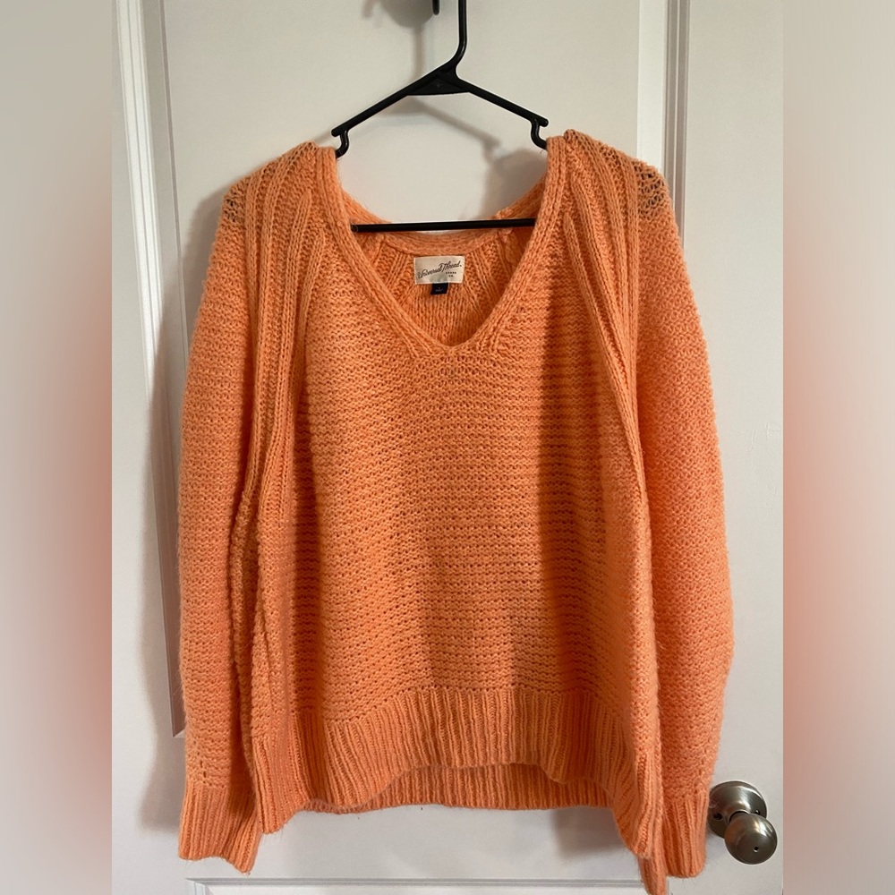 Orange puffy sleeve sweater